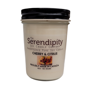 Serendipity Soy Candle Company candle jar with 'Cherry & Citrus' label on a white background
