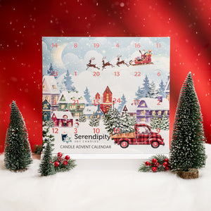 Serendipity Advent calendar with Christmas scene, trees and a red background